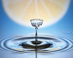 Grapefruit and water drop